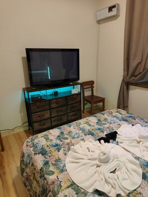 3 habitaciones, tabla de planchar con plancha, wifi y ropa de cama 