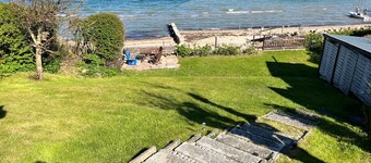 fewo1846 - StrandNest - House with view of the fjord, fireplace, sauna and 3 bed