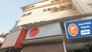 A building with a sign for Innra Hotel Kolkata and a GoStays logo. - Innra Hotel Kolkata (Kolkata)