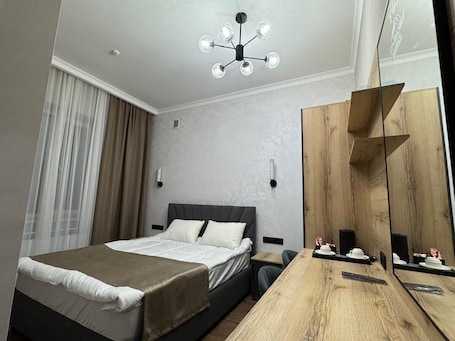 Standard Double Room, Private Bathroom | Desk, laptop workspace, blackout drapes, soundproofing. Toi At-Bashy hotel