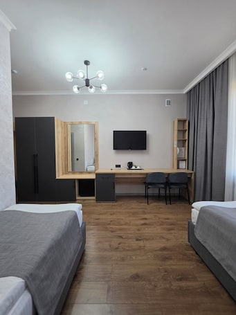 Standard Twin Room, Private Bathroom | Desk, laptop workspace, blackout drapes, soundproofing