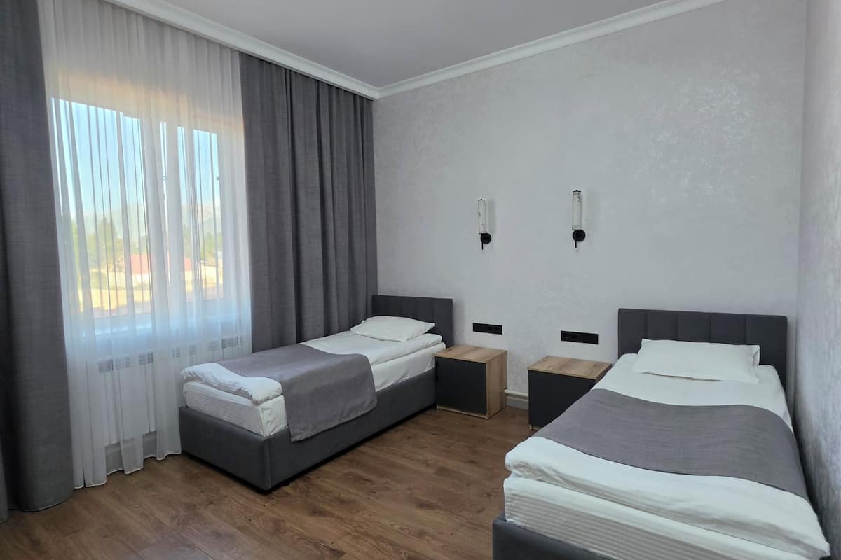 Standard Twin Room, Private Bathroom | Desk, laptop workspace, blackout drapes, soundproofing