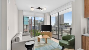Luxury Condo, 2 Bedrooms, 2 Bathrooms, City View | Living area | 55-inch Smart TV with digital channels, Netflix, foosball - RS Suites - Miami World Center (Miami)