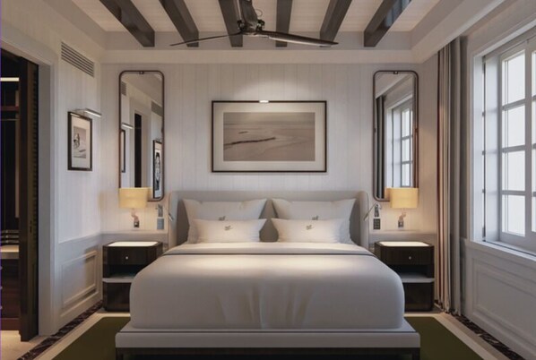 Deluxe Suite | Minibar, in-room safe, desk, laptop workspace