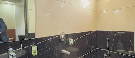 Shower, free toiletries, towels, soap