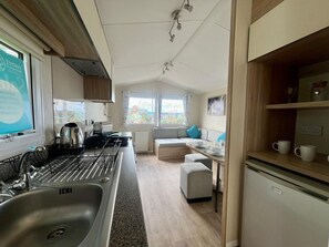 Private kitchen - Seaside Caravan in a Leisure Park with WiFi & Parking - 3 bedrooms (Rhyl)