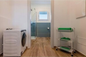 Shower, hair dryer, bidet, soap - Tower View & Double Balcony - Modern Studio Apartment with Parking (Pisa)