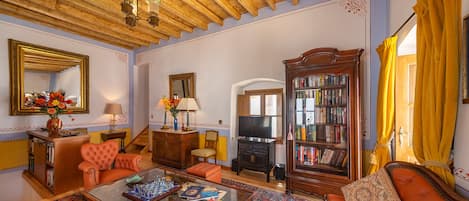 Smart TV, DVD player, books, video library