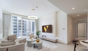 Luksushuoneisto, parveke, rantanäköala | Oleskelualue