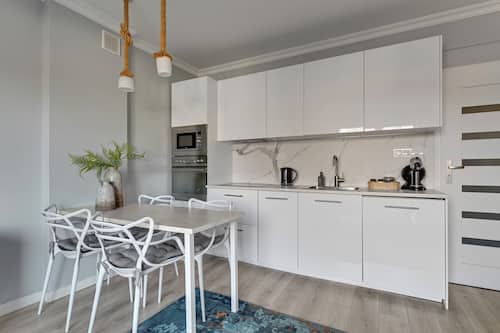 Familieleilighet, byutsikt | Spiseområde