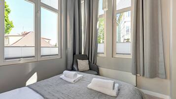 Departamento Deluxe, cocineta, vista al patio