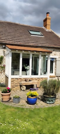 Exterior. Chambre d’hôtes “Chambre Orange” with Shared Terrace, Garden, and Wi-Fi