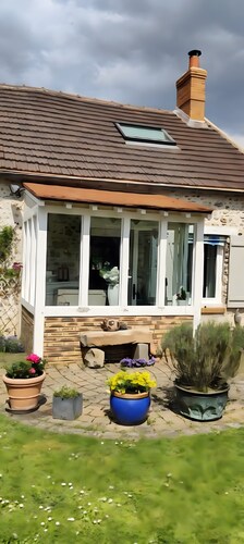 Chambre d’hôtes « Chambre Rose » avec terrasse partagée, jardin commun et Wi-Fi