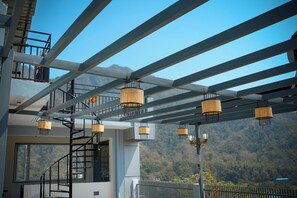 Deluxe Double or Twin Room, Balcony, City View | Terrace/patio - Whispering Ganga By Four Hills (Rishikesh)