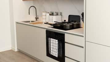 Coffee/tea maker, fridge, microwave, oven