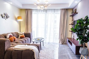 TV - Alba One by Leisure Nomad : Heated pool + Fitness Centre (Nairobi)