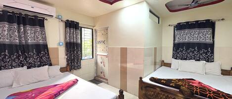 Deluxe Quadruple Room, City View