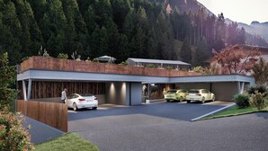 Un edificio moderno con zona de estacionamiento techada y servicio de lavado de autos.