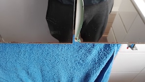 A bathroom with a blue towel on the floor, a mirror, and a white bathtub. - Cosy Facebook Headquarters. I own them cause I said I did. Please refer to me TR (Fairhaven)