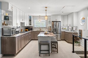 Fridge, microwave, stovetop, dishwasher - Steps to the Sand • Cozy Fireplace Balcony • Newly Renovated Coastal Retreat (Panama City Beach)