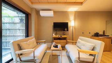 Luxury Twin Room, Patio, Garden View | Desk, laptop workspace, iron/ironing board, free WiFi