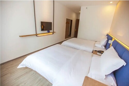 QīTiānYōupǐnZhāngjiājièDàyōngGǔchéngDiàn