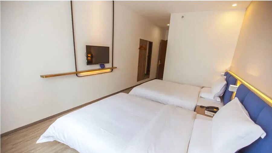 QīTiānYōupǐnZhāngjiājièDàyōngGǔchéngDiàn