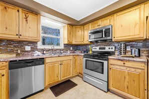 Private kitchen - Spacious 5-bedroom home with Hot Tub! 5 Minutes to Wisp! Pool and Gym Access! (Accident)