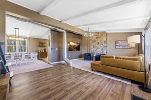 Living area - Spacious 5-bedroom home with Hot Tub! 5 Minutes to Wisp! Pool and Gym Access! (Accident)