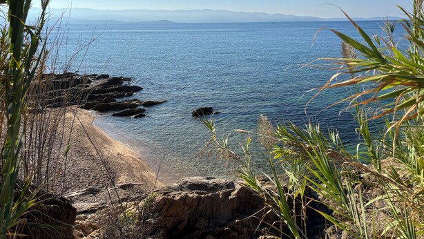 A coastal landscape with clear skies, rocky shoreline, and calm sea. - Apartment with Panoramic Sea View (Ajaccio)