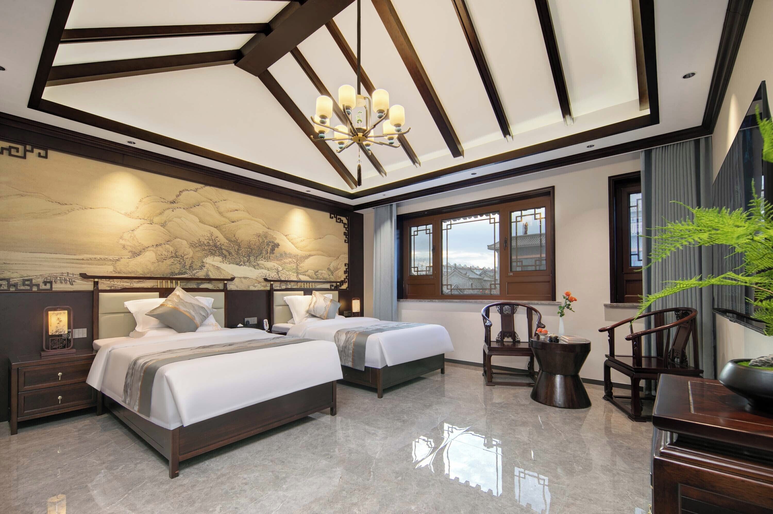 Quarto duplo panorâmico, vista para o mar | Área de estar