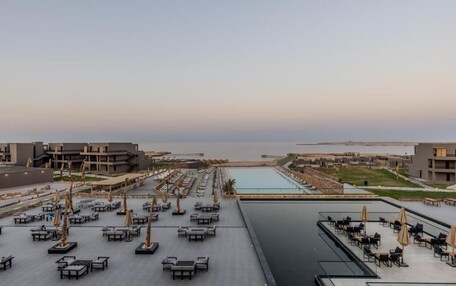2 outdoor pools, pool umbrellas, sun loungers