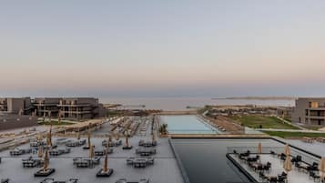 2 outdoor pools, pool umbrellas, sun loungers