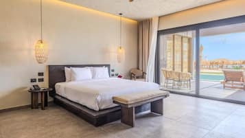 Suite Junior, balcon | Coffres-forts dans les chambres, rideaux occultants, Wi-Fi gratuit