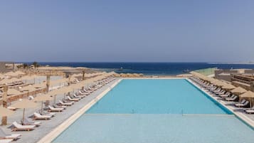 2 outdoor pools, pool umbrellas, pool loungers