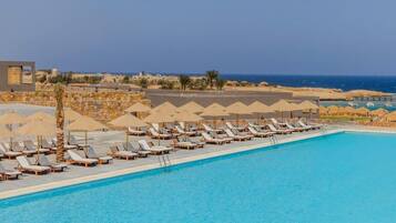 2 outdoor pools, pool umbrellas, pool loungers