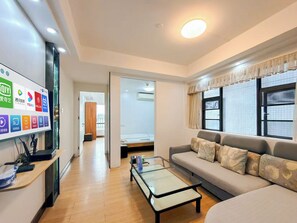 Condo, Patio, City View | Living area - Li He Yu Jia Apartment Hotel (Zhongshan)