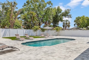 Outdoor pool, a heated pool - Welcome to Tropical Breeze Oasis w/ heated pool and relaxing back yard & patio (Sarasota)