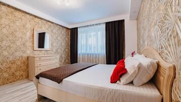 2 chambres, fer et planche à repasser, Wi-Fi, draps fournis