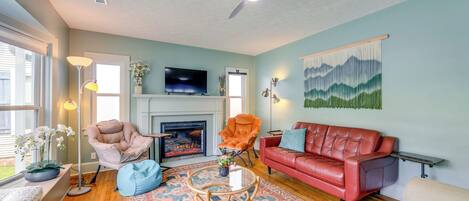 TV, fireplace, books