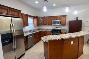 Private kitchen - Charming 2BR Retreat with Garden (Bodden Town)