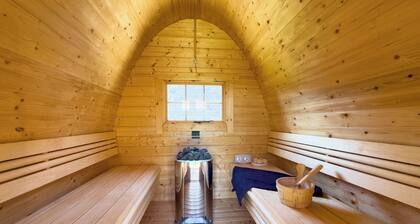 Modern bungalow directly on the Wangermeer with fenced garden, wooden sauna, two bathrooms, fully equipped kitchen - ideal for families, couples and vacations with dogs.