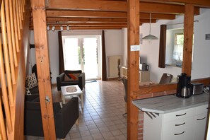 Interior - The Nordlys vacation home on the North Sea offers modern comfort with a wood-burning stove, south-west-facing terrace and fenced garden - perfect for families and couples. (Hooksiel)
