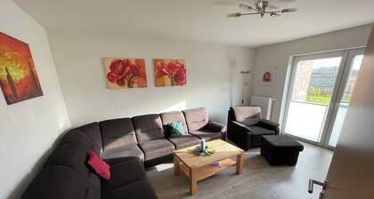 Family-friendly house with terrace, garden, 4 bedrooms and 2 bathrooms in a quiet location near the North Sea.