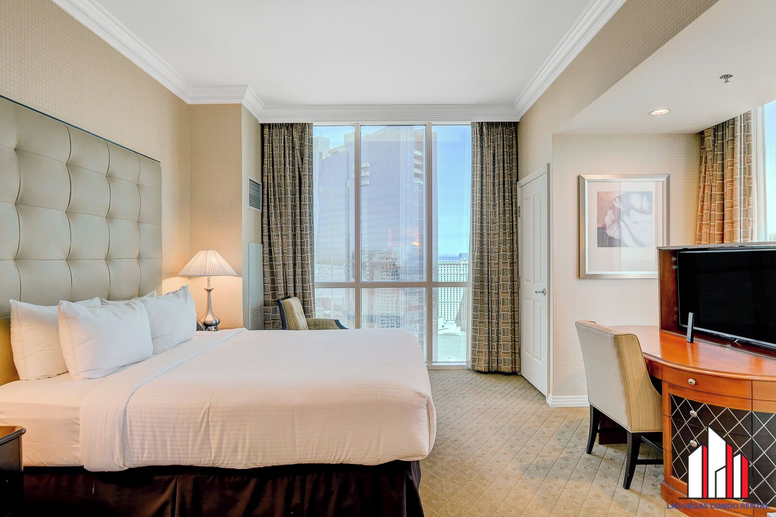 1 Bedroom Strip View Suite w/ Balcony | Laptop workspace, iron/ironing board, bed sheets