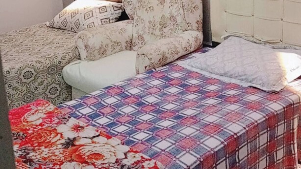 A bedroom with a bed, two nightstands, a lamp, and a wardrobe. - Room-standard Twin Bedroom (Istanbul)