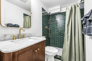 Shower, hair dryer, towels, soap - NOLA Chic, 5BR w/Hot Tub, Yard–Near French Quarter (New Orleans)