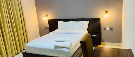 In-room safe, desk, laptop workspace, blackout drapes