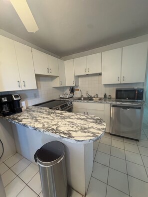 Departamento familiar, vista al océano | Cocina privada