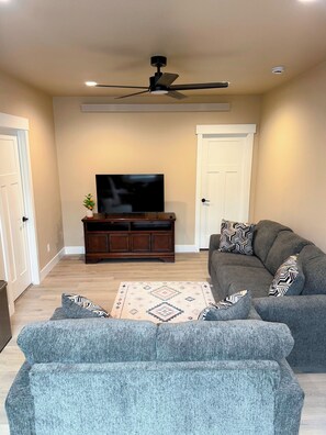 Living area - New Construction Cozy 1 Bedroom Basement Apartment in Laramie (Laramie)